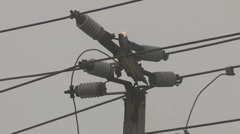 Broken and burning hydro poles after storm Stock Footage 47949218