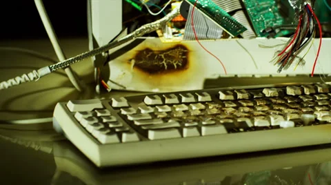 Broken and burnt computer Stock Footage 33847207