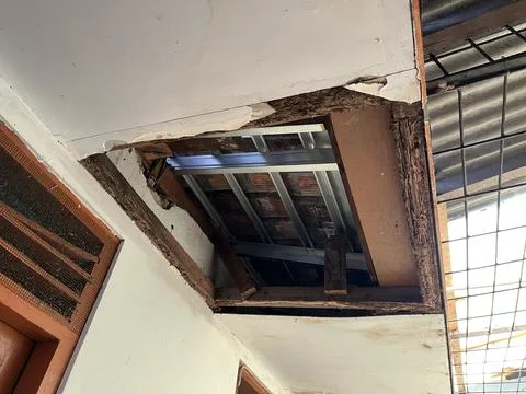 Broken and collapsed house ceiling Stock Photos