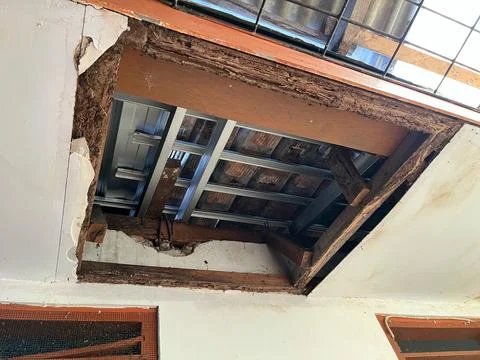 Broken and collapsed house ceiling Stock Photos
