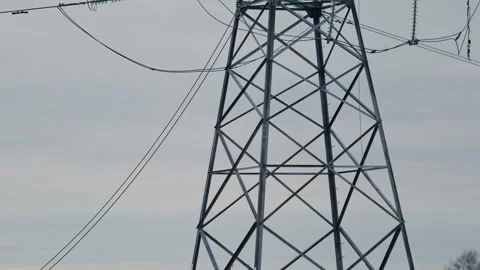 A broken and fallen high-voltage tower against the backdrop of a sunset sky. Stock-Footage 241358187