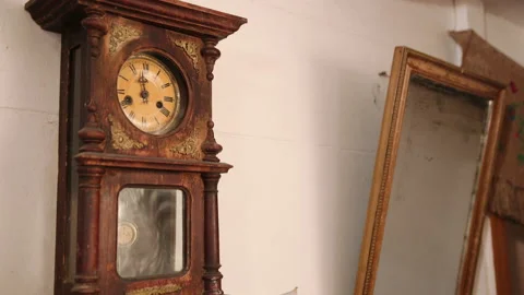 Broken antique mechanical wall clock that once showed the hour in room. Time Stock Footage 152420336