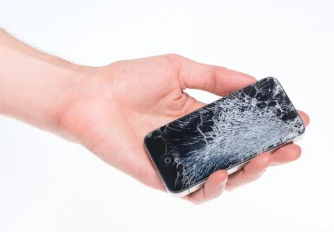 Broken apple iphone 4 in hand Stock Photos