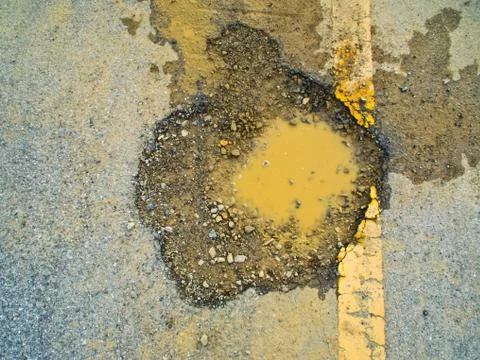 Broken asphalt Stock Photos