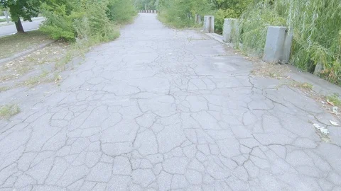 Broken asphalt road Stock Footage 115978885