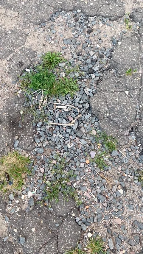 Broken asphalt road. Vertical video Stock Footage 283379513