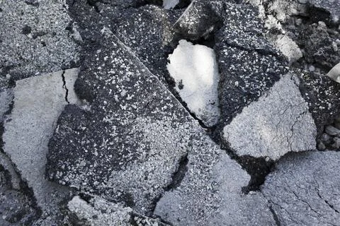 Broken Asphalt texture background . Road repair concept Stock Photos