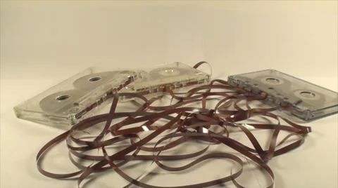 Broken Audio Cassettes Isolated On White, Loose Tape, Retro, Media, Tilt Shot Video stock 39657660