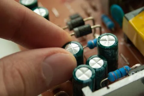 Broken bad old capacitor Stock Photos