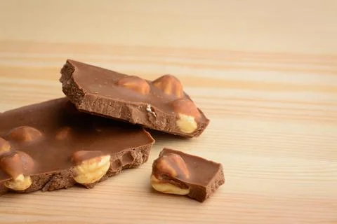 Broken bar of chocolate Stock Photos