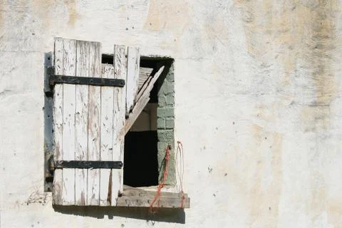 Broken barn window shutter Stock Photos