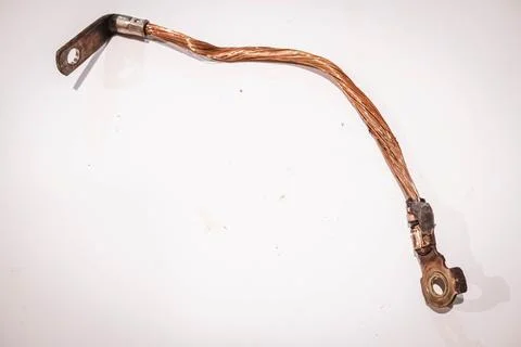 A Broken Battery Ground Cable or Strap of VW Tiguan 2014 Stock Photos