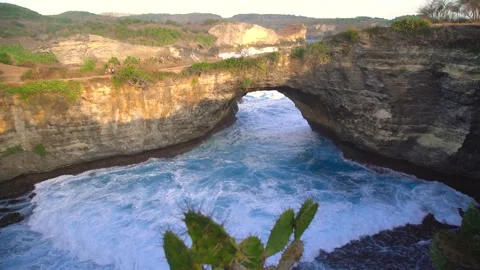 Broken Beach, Bali, with a large cliff and rock arches. Stock Footage 273144727