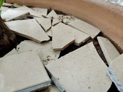 Broken beige ceramic tiles Stock Photos