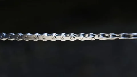Broken bicycle chain. One link of chain in hundreds pieces. Render CGI Stock Footage 201244749