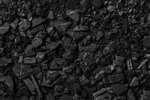 Broken black eyeshadow powder background Stock Photos