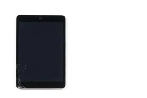 Broken black tablet on white background Stock Photos
