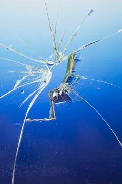 Broken blue glass window Stock Photos