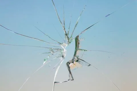 Broken blue glass window Stock Photos