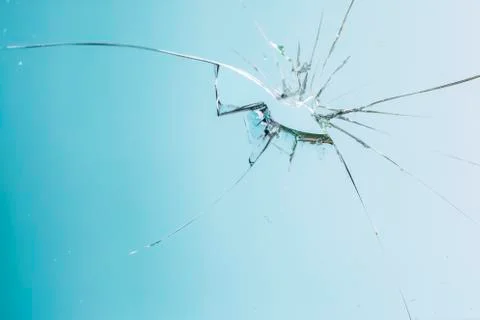 Broken blue glass window Stock Photos