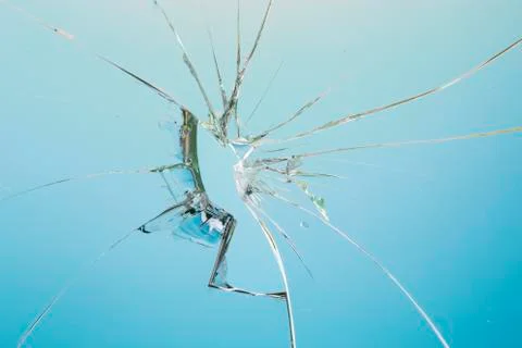 Broken blue glass window Stock Photos
