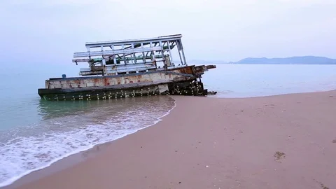 Broken boat on the beach Stock Footage 89785072