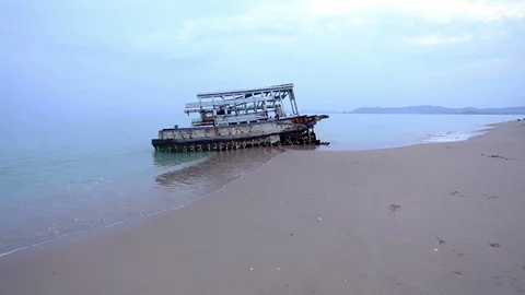 Broken boat on the beach Stock Footage 89785080