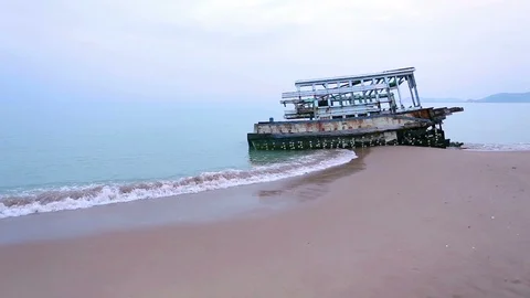 Broken boat on the beach Stock Footage 89785091