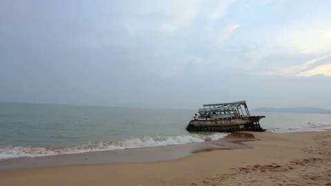 Broken boat on the beach Stock Footage 89785098