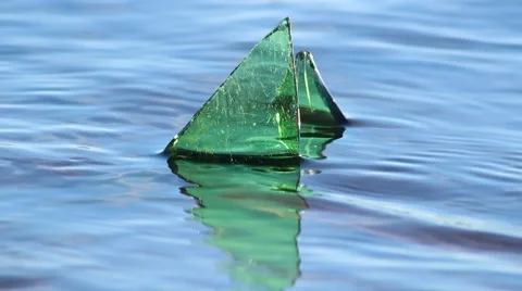 Broken bottle in shallow water Stock Footage 40645107