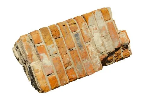 Broken brick pillar falling. Piece of brick column on isolated white backgrou Stock Photos