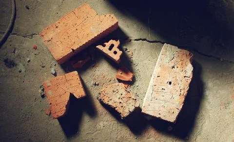 Broken bricks at the construction site - top view Stock Photos