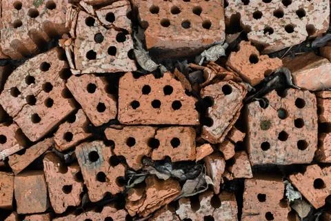 Broken bricks lies on the ground Foto stock