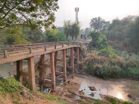 Broken bridge in the forest Stock Photos