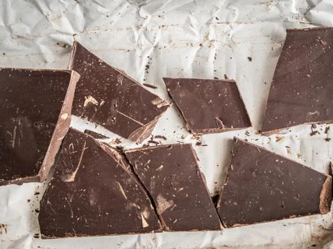 Broken brown chocolate Stock Photos