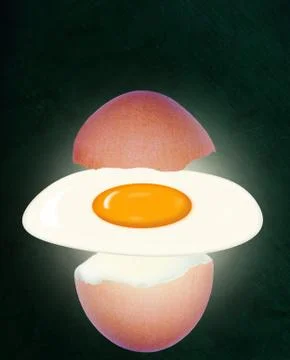 Broken Brown Eggshell With Floating Fried Egg on Chalkboard Background Stock Photos