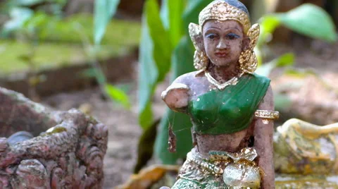 Broken Buddhist offering Stock Footage 69022007