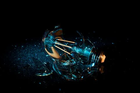 Broken bulb blue light Stock Photos