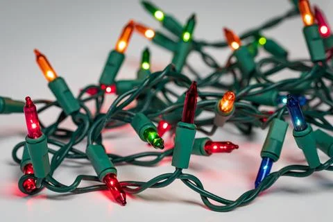 Broken bulb in Christmas string lights. Fotos de archivo
