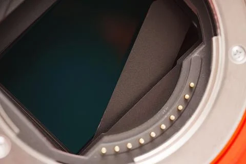 Broken camera shutter component reveals internal mechanics and damage Stock Photos