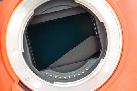 Broken camera shutter reveals internal components in detailed close-up view Stock Photos