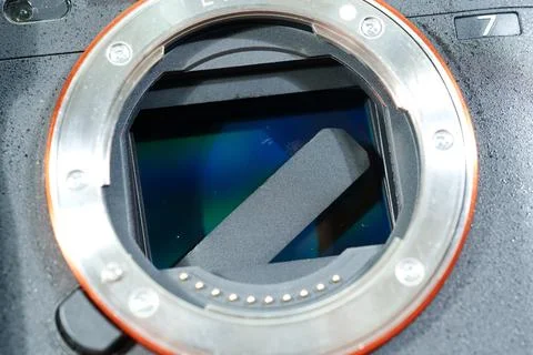 Broken camera shutter reveals sensor and internal components during inspection Stock Photos