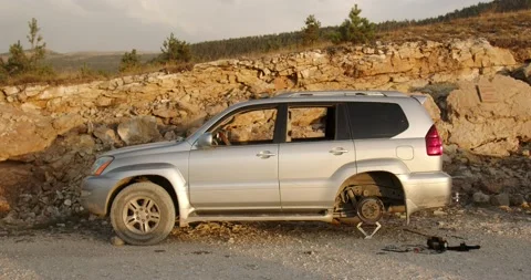 Broken car in the mountains Stock Footage 232014099