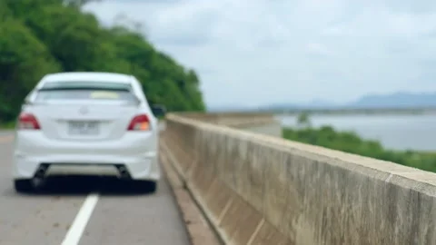 A broken car parked on the side of the road Stock Footage 147976028