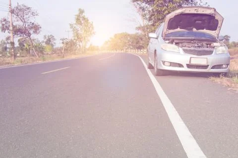 Broken car on road. Stock Photos