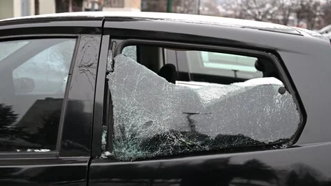 Broken car window. Broken rear car window. Burglary and theft Stock-Footage 303939970