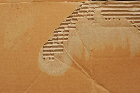 Broken cardboard background Stock Photos