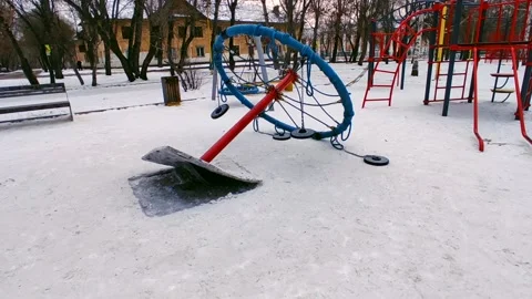 Broken carousel in the winter on the street Video stock 228162411