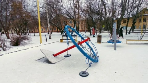 Broken carousel in the winter on the street Stock Footage 228162436