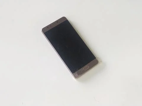 Broken cellphone picture with white background  Stock Photos